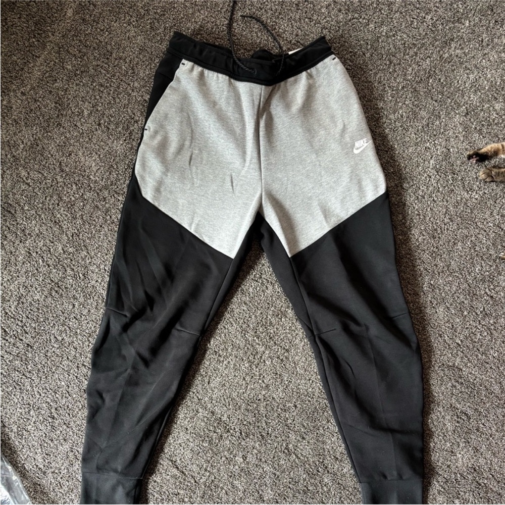2 Nike Men's Black and Gray Joggers
 1 xl & 1 xxl
